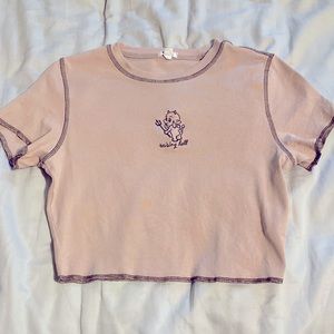 Salmon pink crop top with devil, very flattering and comfortable.